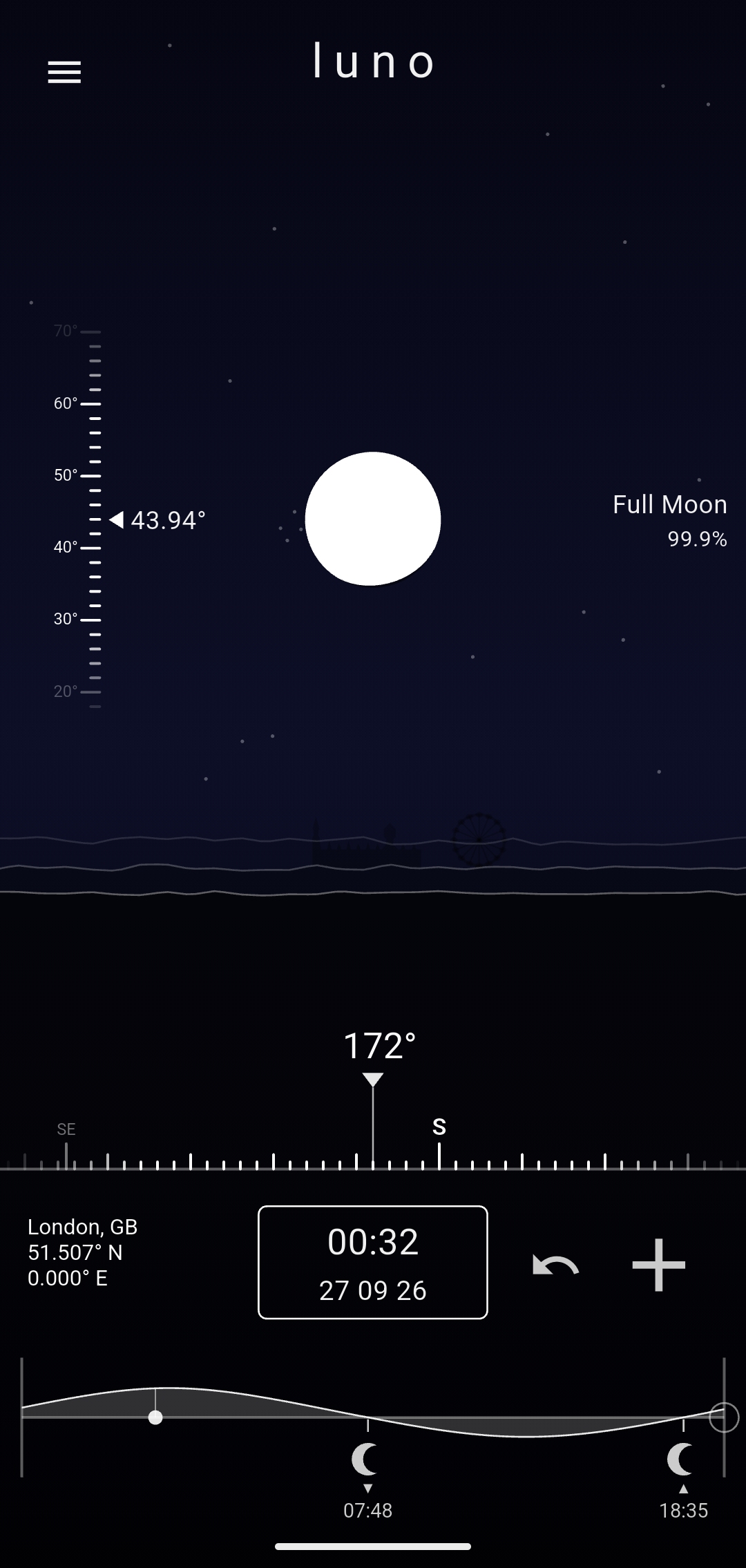 Luno at 00:32 in London. A full moon, 99.9% lit, shines 43.94° up in the south against a dark, starry sky, with faint outlines along the hills.